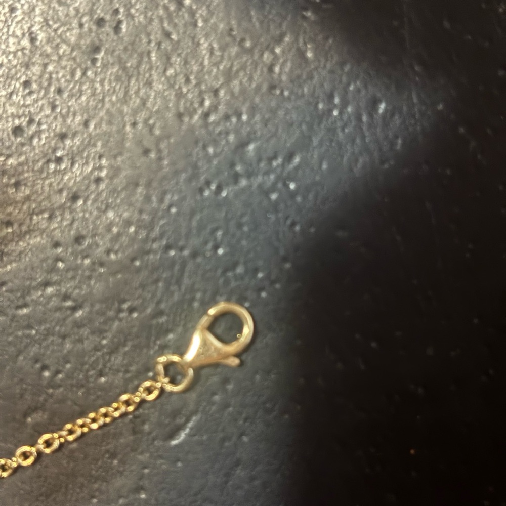 Cartier Gold Interlocking Rings Bracelet with Delicate Chain - Picture 3 of 12